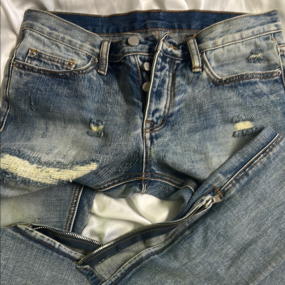 Distressed Blue Denim Jeans